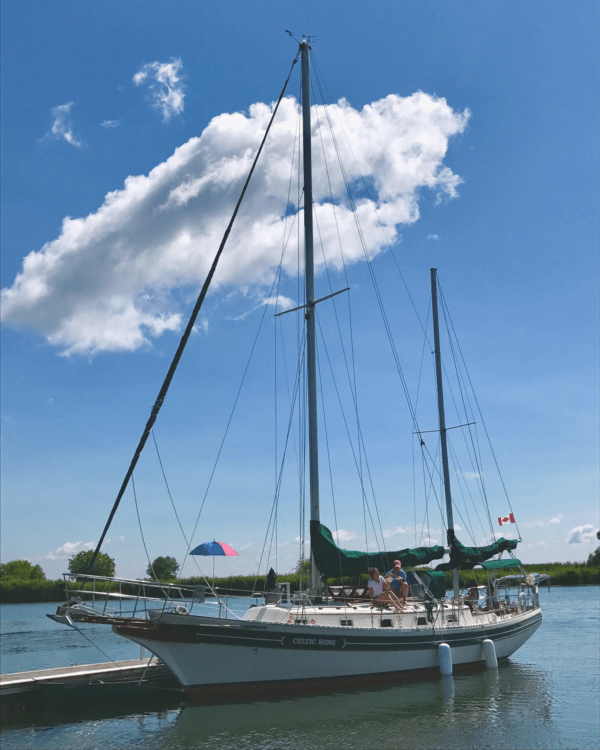 celtic song sailboat at dock